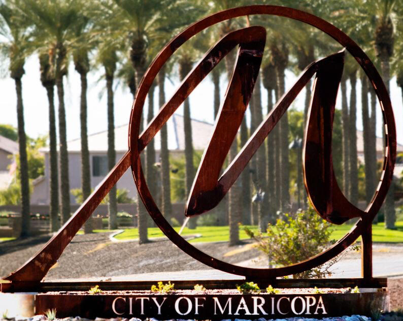 City of Maricopa Sign – Process Server Services & Legal Support City of Maricopa sign with palm trees in the background, representing legal and business services including process serving.